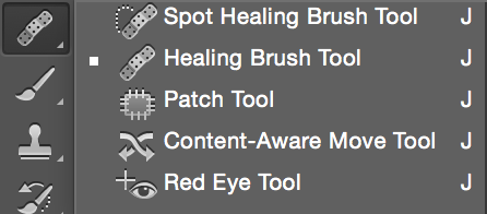 The retouching tool panel featuring Spot Healing Brush, Healing Brush, Patch, Content Aware Move, and Red Eye tools