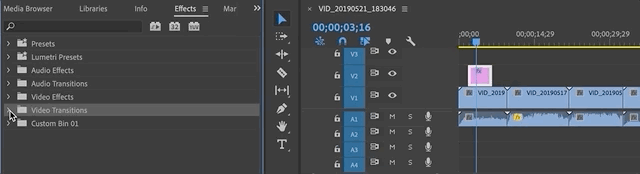 Clicking and dragging a video transition from the Effects panel to a clip on the Timeline